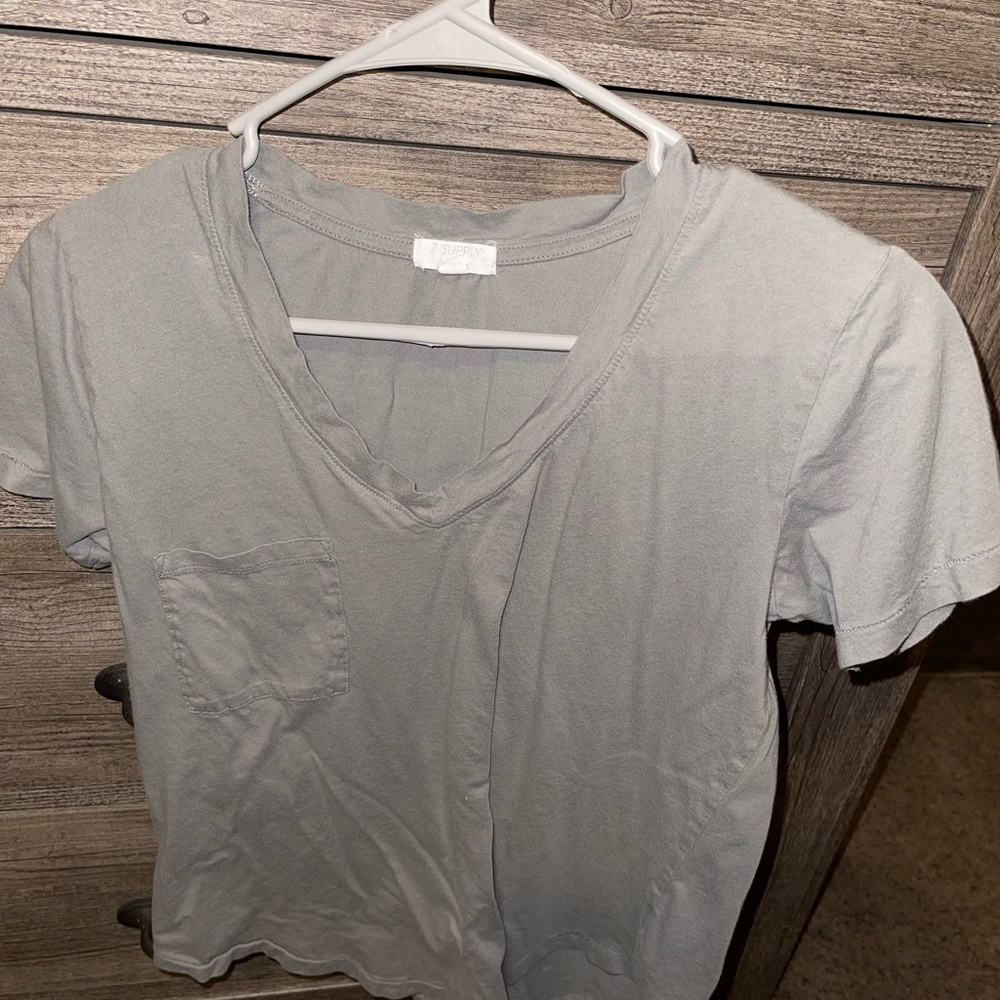 A green vneck shirt